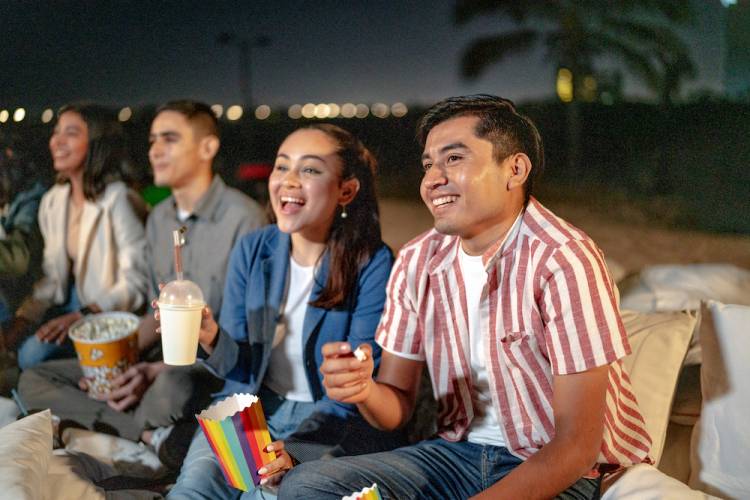 family watching movie outside